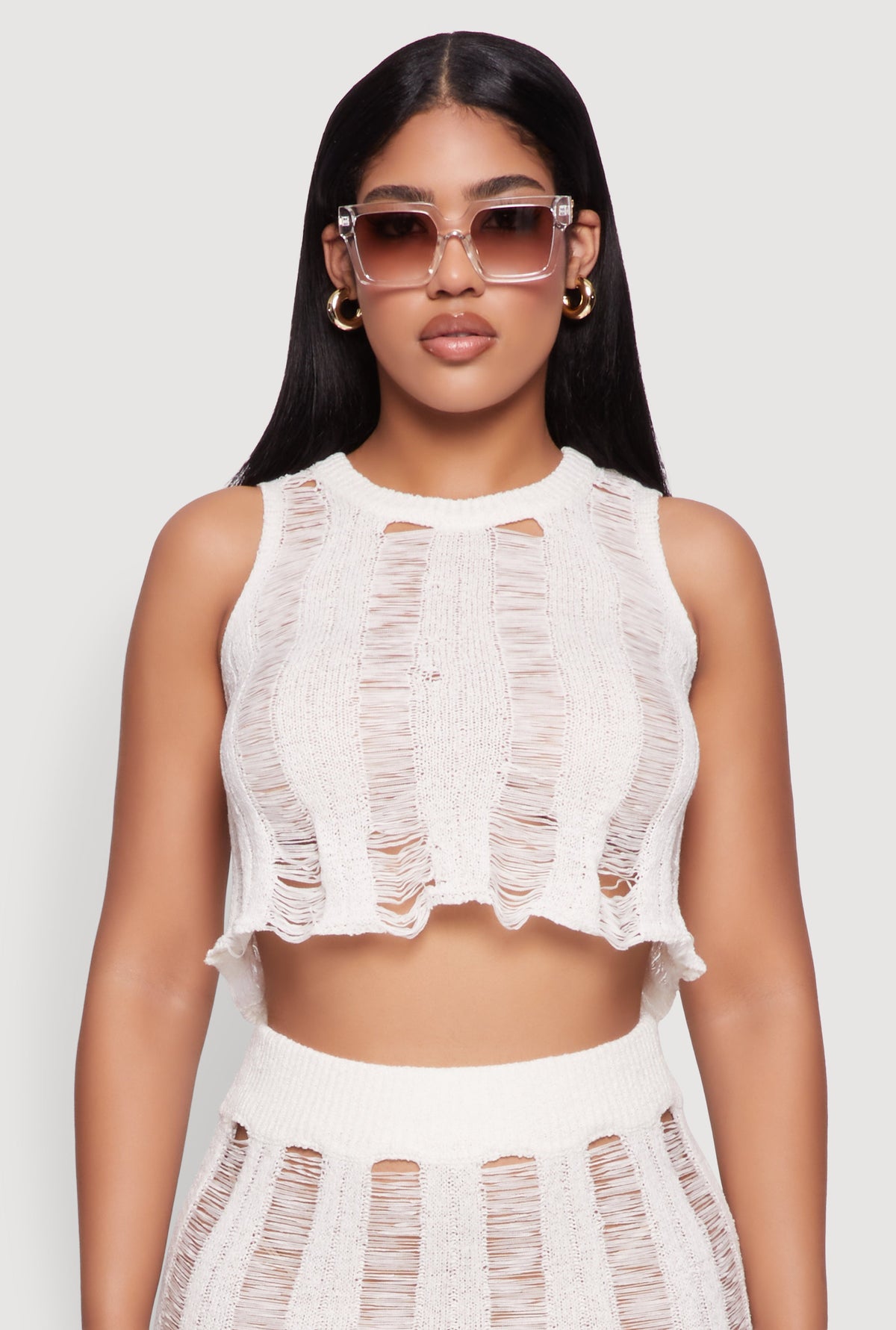Trendy Sleeveless Distressed Crop Top